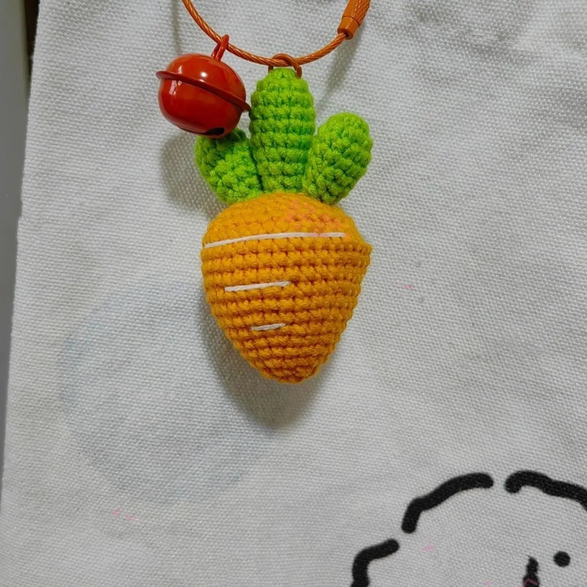 Soft wool cartoon carrot keychain pendant on a metal ring for car keys