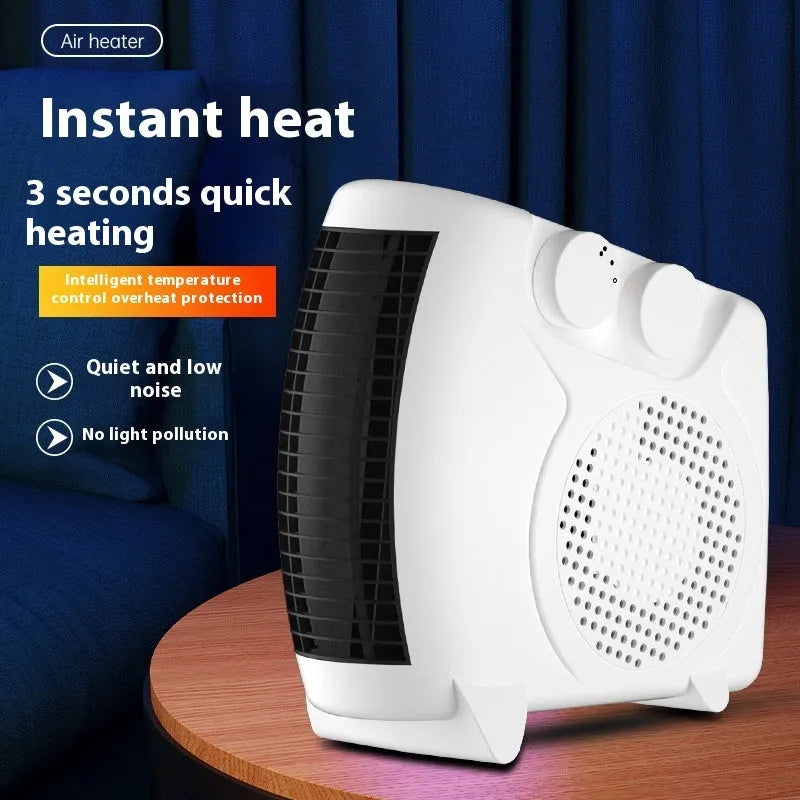 Small white desktop electric warm air blower heater with power controls.