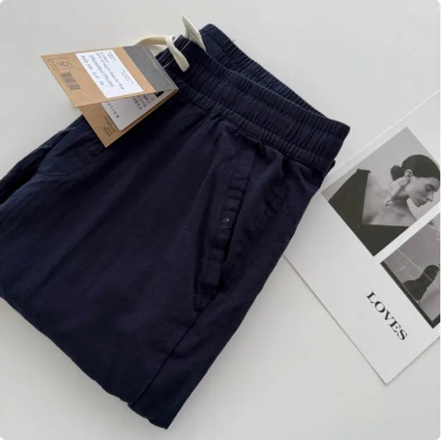 Men's loose straight-leg casual trousers in thin fabric with drawstring waist, shown in multiple colour options