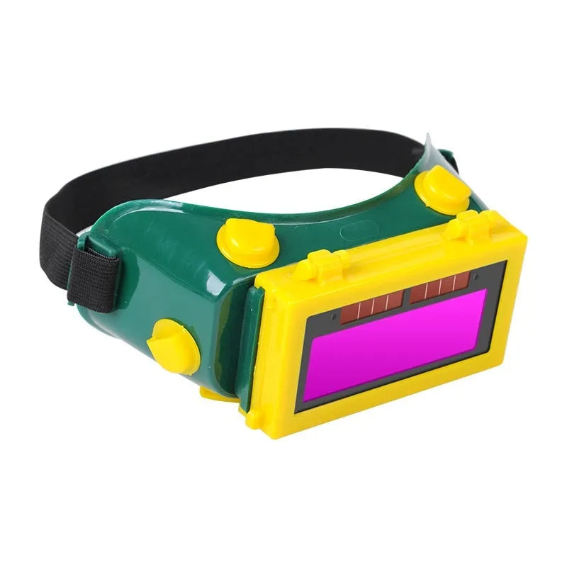 Light-changing electric welding glasses head-mounted type in green with flip dimmer and PVC frame