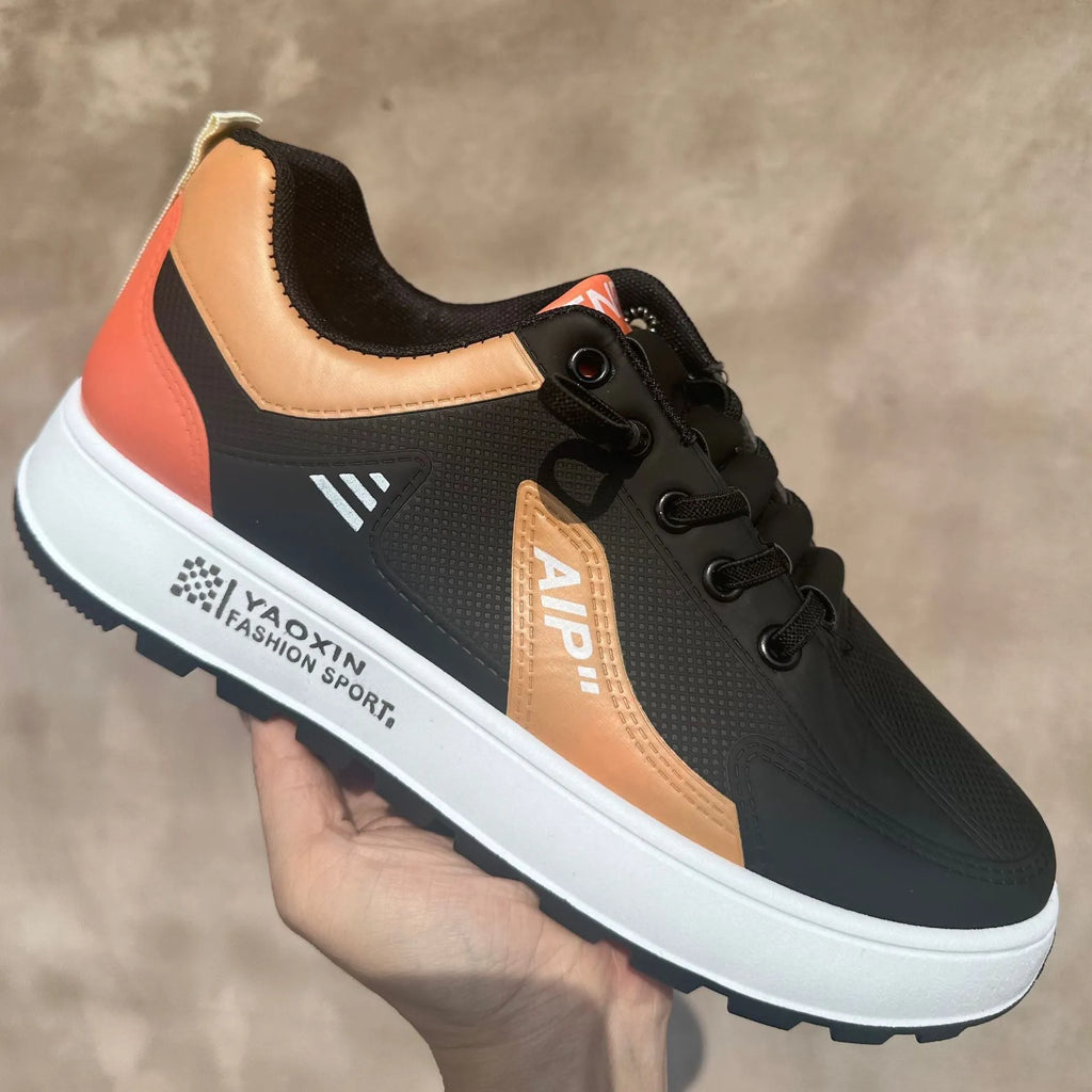 Men's casual shoes in white with black, brown or orange accents, round toe design, artificial PU upper