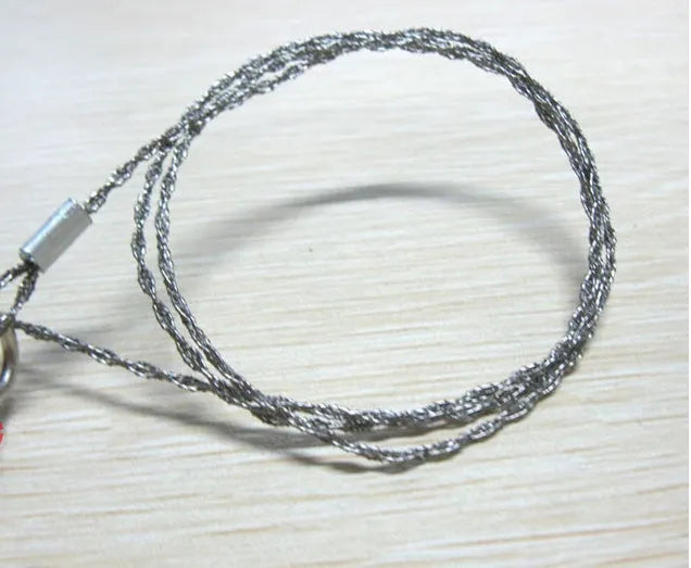 Outdoor survival wire saw with stainless steel blade, pull rings, and approximately 55cm cutting length