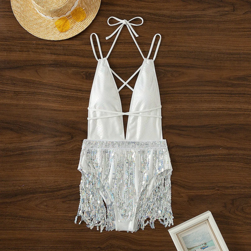 White women's deep V neck one-piece swimsuit with tassel detailing and brief style cut