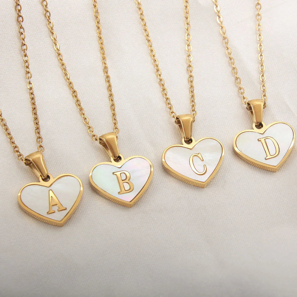 Gold plated heart-shaped necklace with letter personalisation on 45cm adjustable chain
