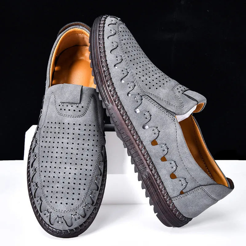 Men's brown slip-on casual shoes with artificial PU upper and flat PVC sole, showing sewing line details