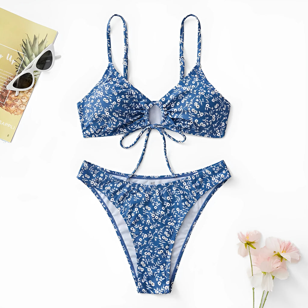 Blue ladies' two-piece swimsuit set with top and shorts on a mannequin.