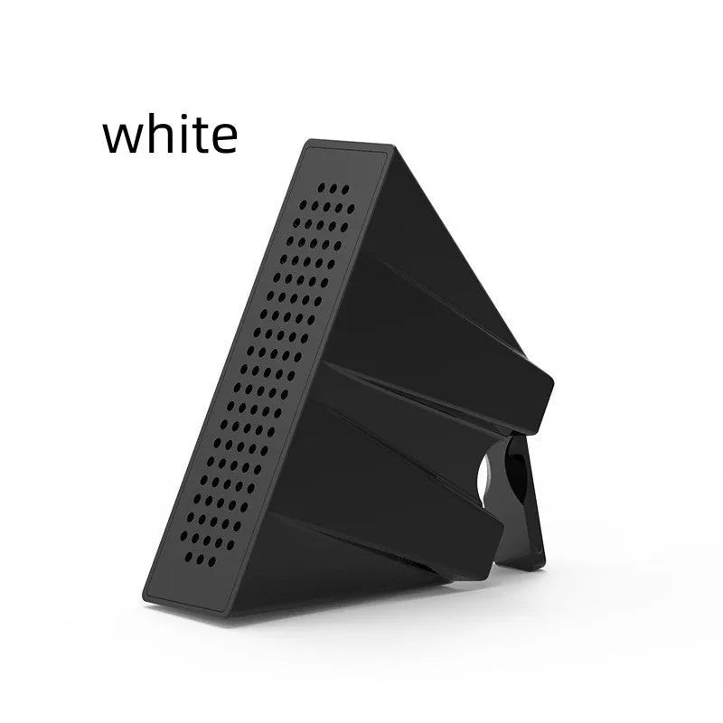 A small, coloured plastic mobile phone amplifier bracket holding an iPhone on a desktop.