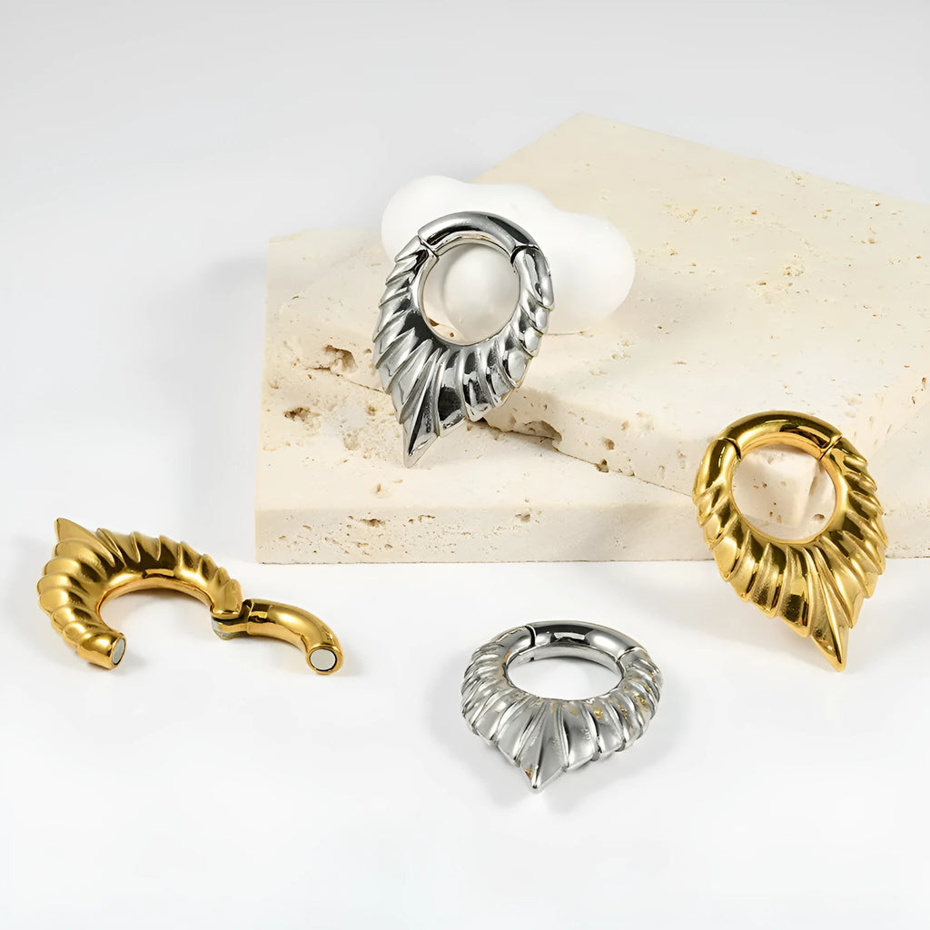 Stainless steel drop-shaped ear extender with totem pattern in four colour variations