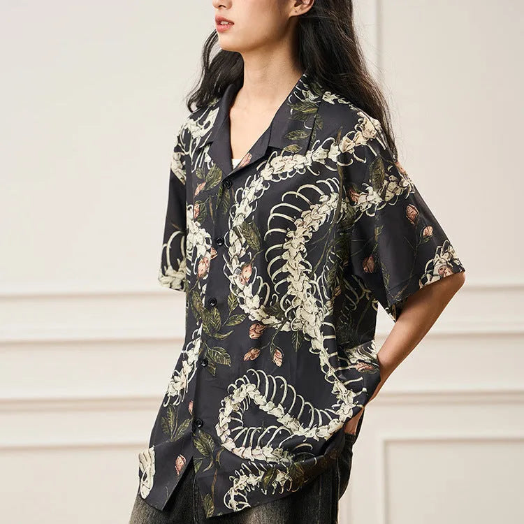 Short sleeve Cuban collar shirt with original snake bone and floral pattern print in a loose fit.