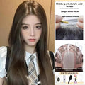 Forehead lace long straight full-head wig in dark brown with side bangs on a mannequin head