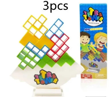 Plastic balance stacking game with 16 coloured blocks, chassis and base for family travel parties
