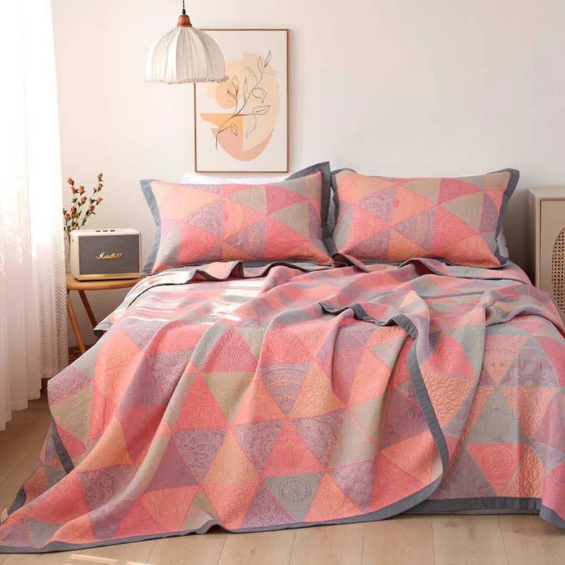 Three-piece cotton gauze bed blanket set with floral pattern showing blanket and two pillowcases