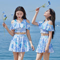 Women's one-piece floral swimsuit in fresh small floral blue, polyester fabric, sizes M-XXL