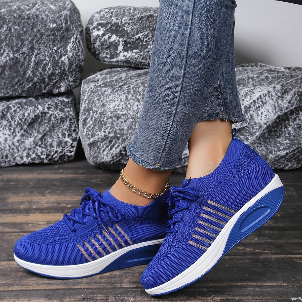 Platform height increasing front lace-up flat shoes for women in black mesh upper and rubber sole with low heel