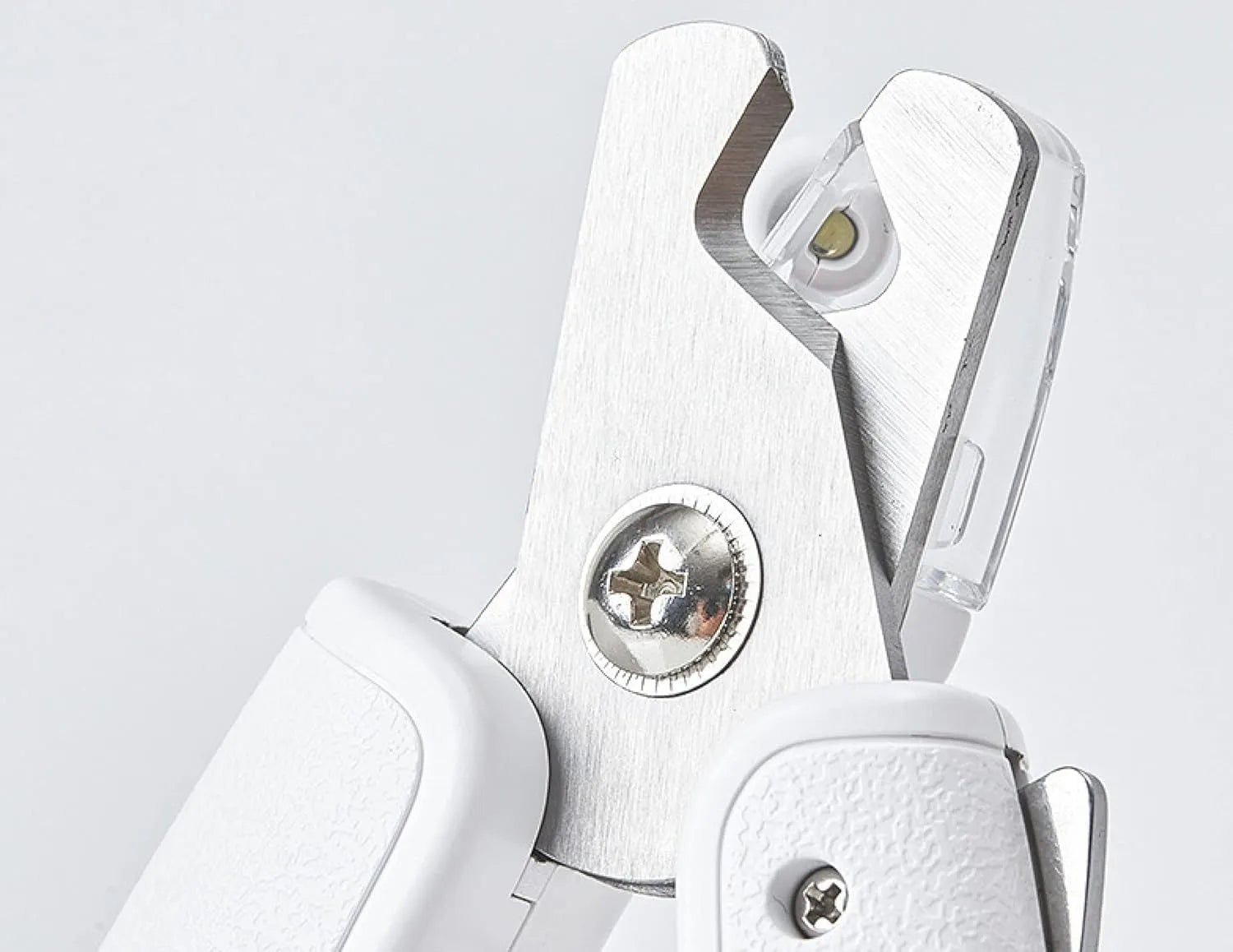 White pet nail clippers with LED light, transparent anti-splash guard, and a leather-like handle.