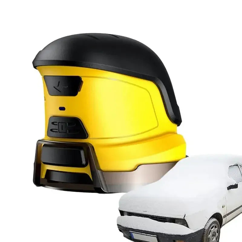 Yellow cordless electric car ice scraper with USB charging cable on a car windshield.