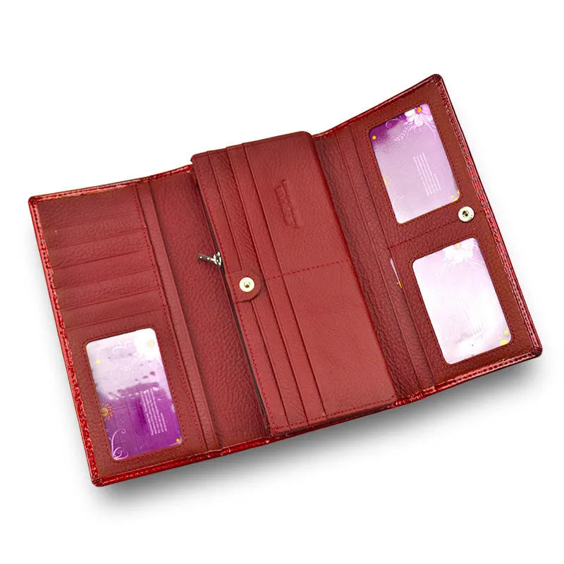 Red crocodile pattern patent leather women's coin purse with pigskin lining.