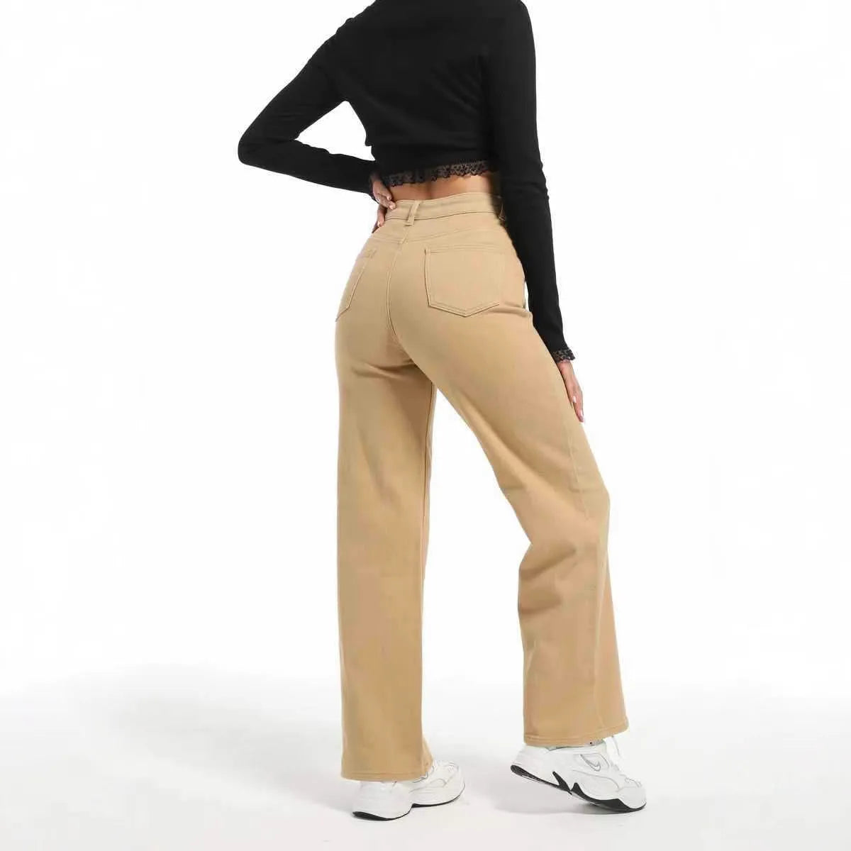 Women's high waist straight leg wide jeans in apricot colour on a hanger.