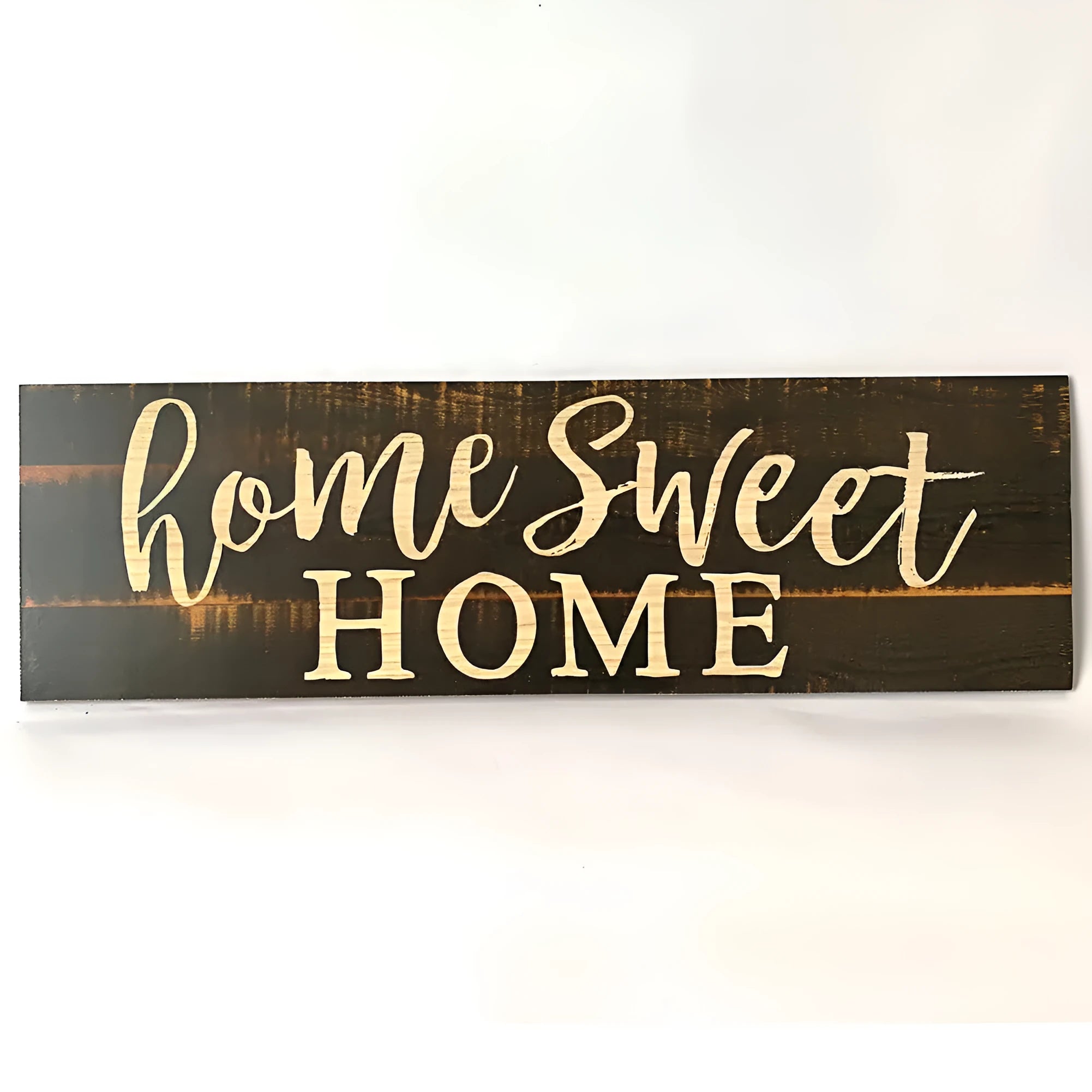 Wooden carved Home Sweet Home hanging pendant decoration in black finish on a light wall