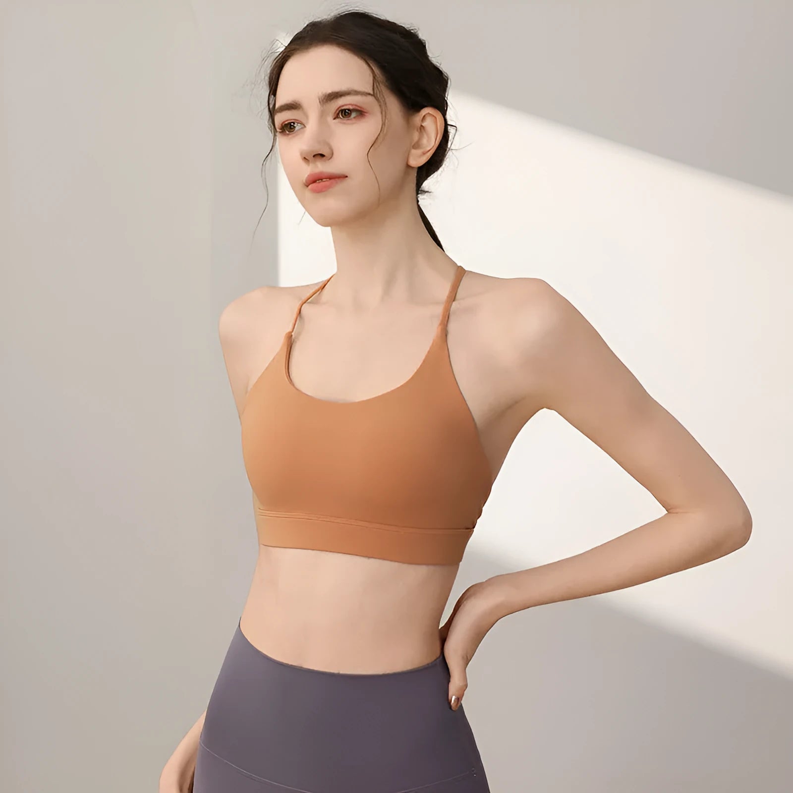 Women's high-strength nylon sports vest in multiple colours with fixed double shoulder straps.