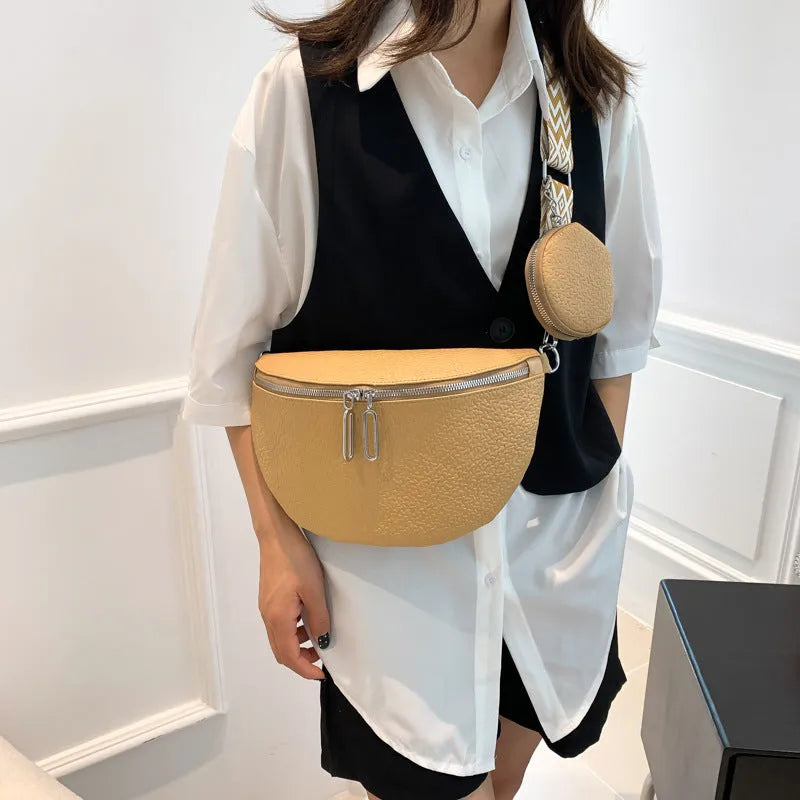 Solid colour PU crossbody bag with saddle lock zipper and sewing thread detail, beige colour, front view