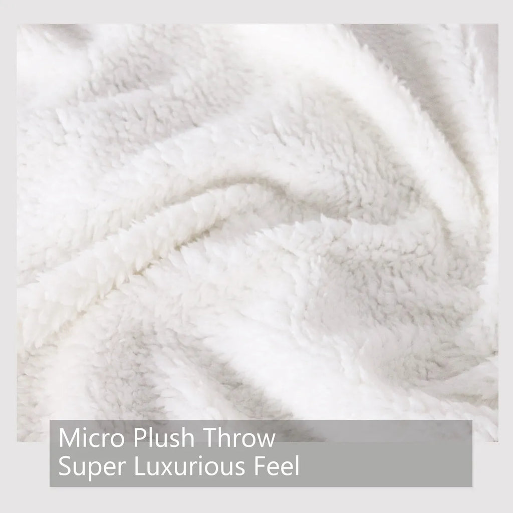 Brown sausage dog themed lamb wool blanket folded on a sofa, 130x150cm size