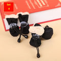 Pet dog four seasons breathable soft bottom non-slip cloth shoes in multiple colours and sizes on a white background.