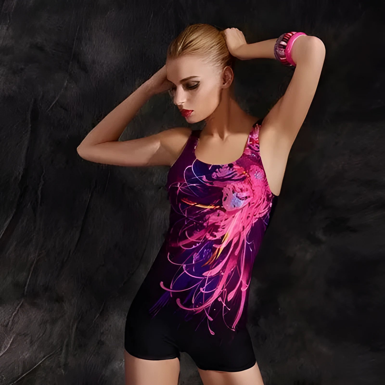 Women's sleeveless one-piece swimsuit in quick-dry polyester, shown in a black and blue colour variant.