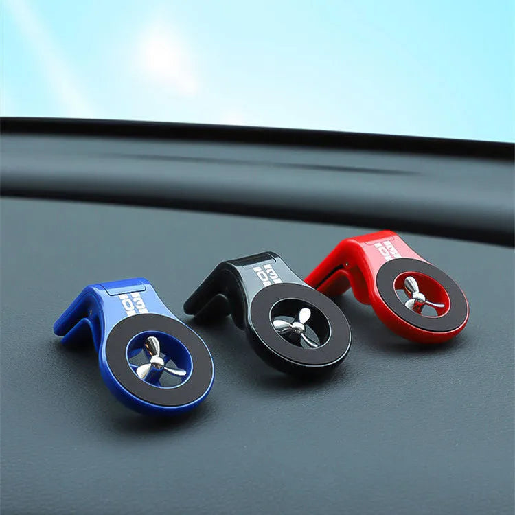 Magnetic car phone holder with fragrance slices attached to car air vent