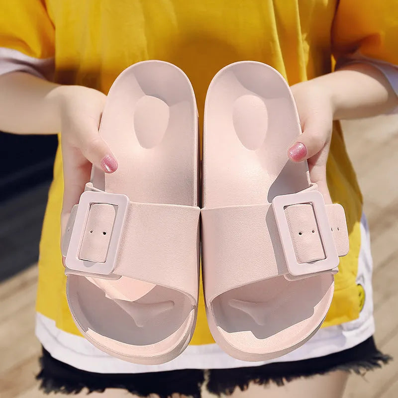 Women's grey blue EVA flip flop slippers with silver buckle closure on soft sole