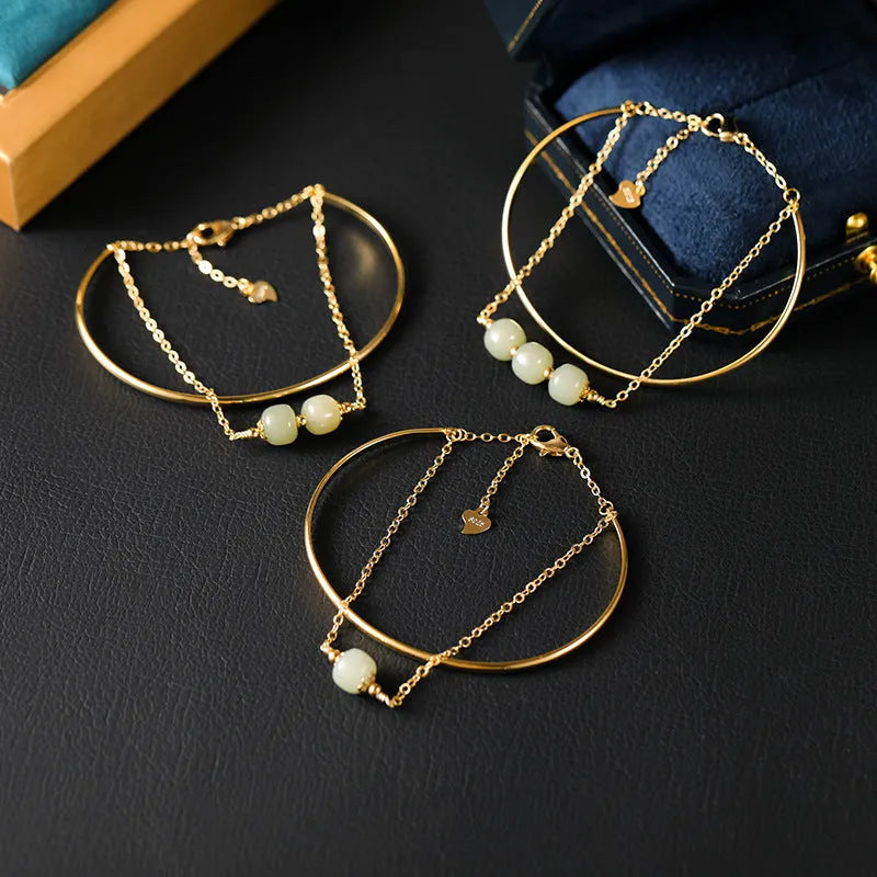 Women's Hetian jade lucky bead bracelet with gold inlay, showing single, double, and three bead version options.