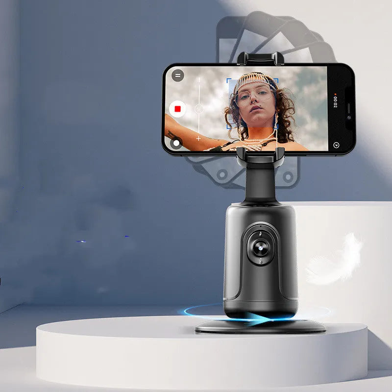 New Automatic Tracking Stabiliser in dark black on desktop with USB cable and 1/4 bracket mount