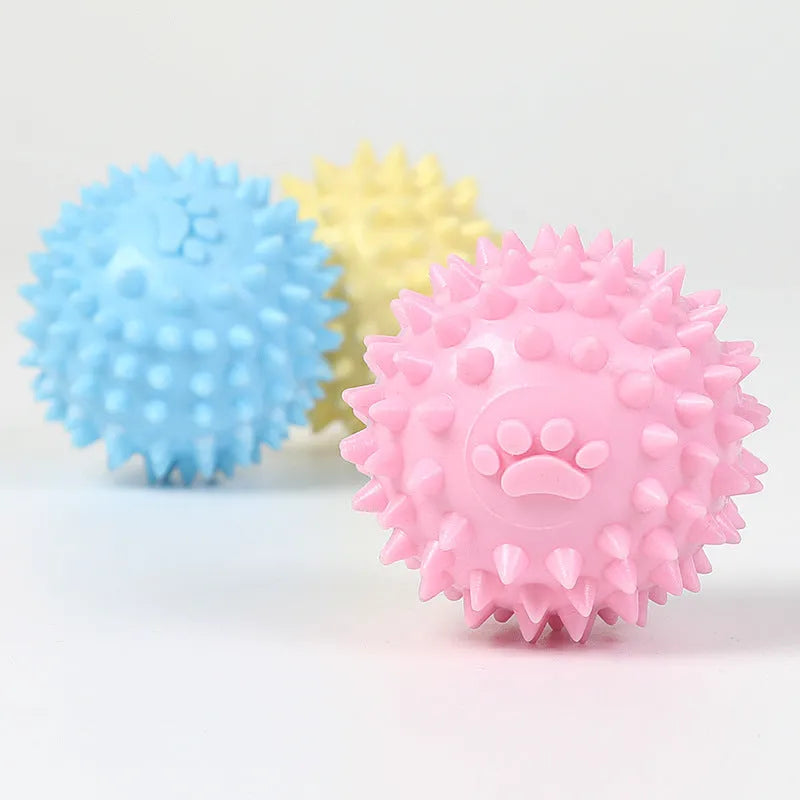 Blue TPR rubber dog chewing ball with textured footprint pattern for tooth cleaning