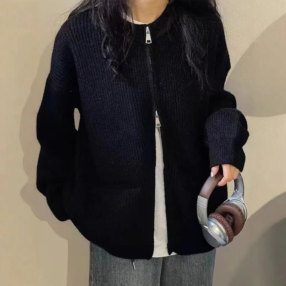 A beige soft glutinous sweater coat cardigan with long sleeves, shown buttoned.