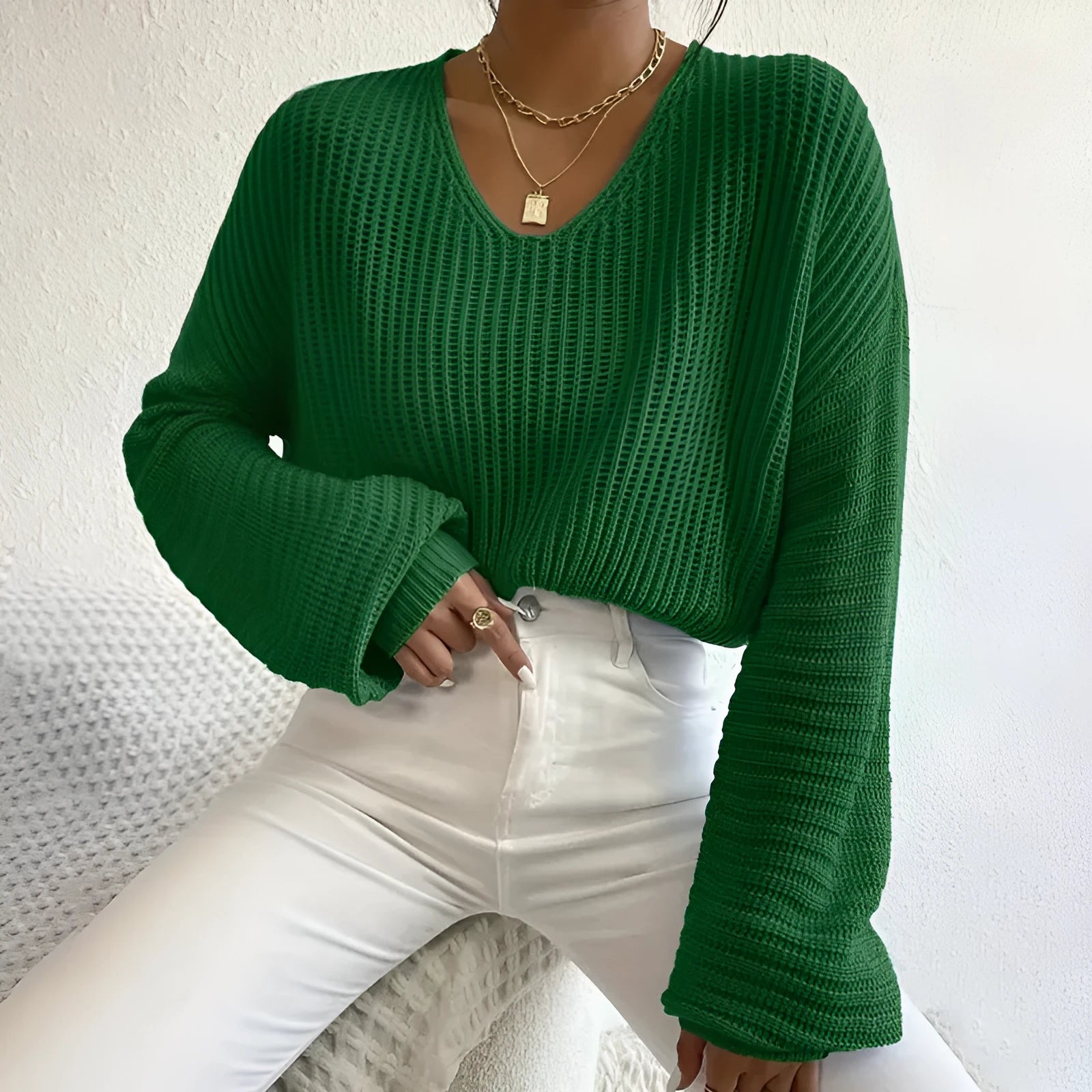 Solid colour women's polyester pullover top with long sleeves in black, pink, green, sky blue, or dark red