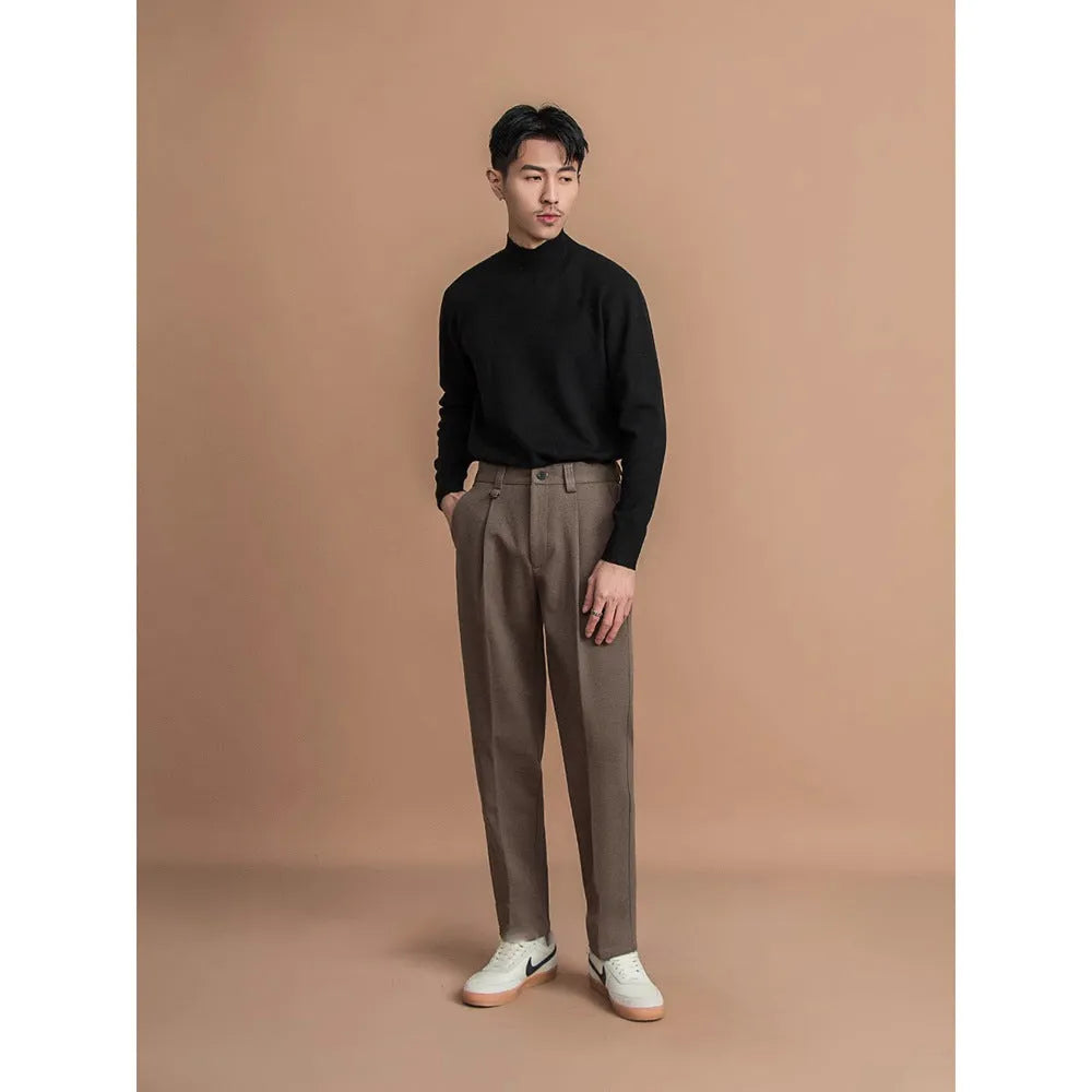 Men's straight leg suit trousers in draped fit, shown in dark grey colour.