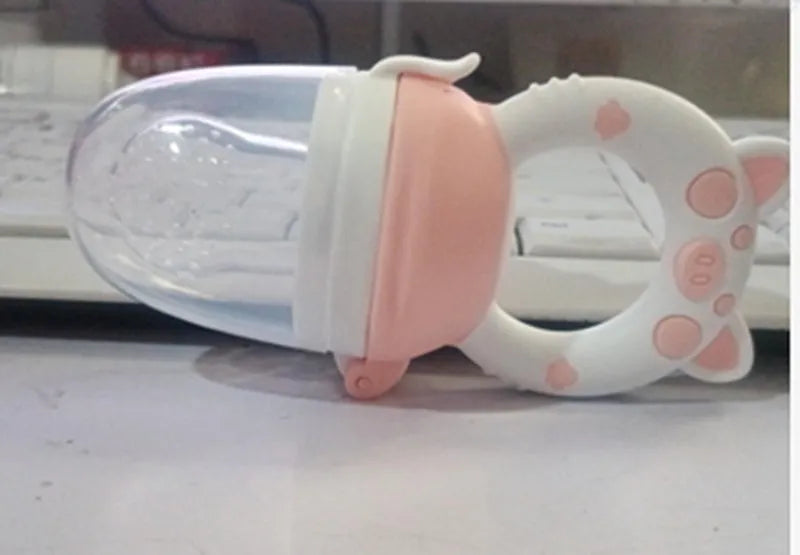 Silicone baby teether with textured chewing surfaces in blue, green and pink colour options