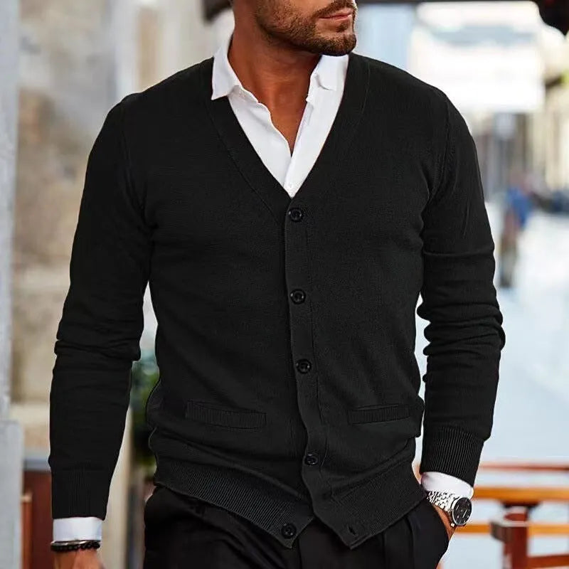Men's slim fit acrylic cardigan in a dark grey colour, showing long sleeves and button front.