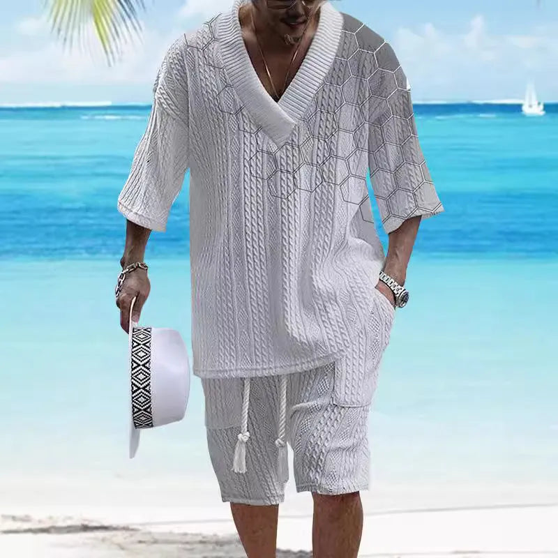 Men's printed drop-shoulder knitted short-sleeve top and matching shorts set on a hanger.