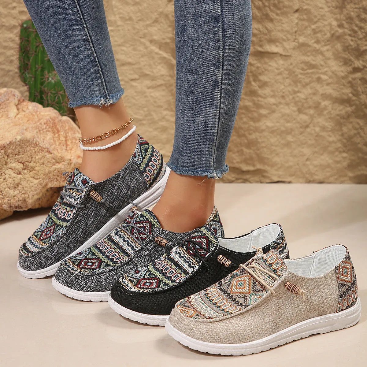 Women's black slip-on flat shoes with round toe and rubber sole