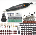 180W electric rotary tool kit with 186 pieces, black, 5-speed control, on a workbench