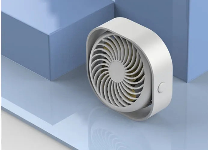 USB desk fan with alarm clock display in modern minimalist design, showing 360-degree rotation.