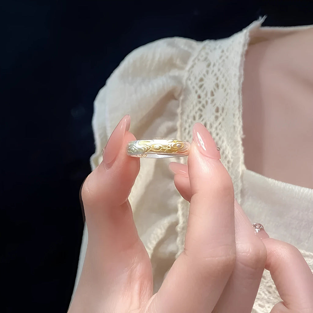 Xiangyun pattern open mouth ring with electroplated silver gold finish showing geometric fairy-style design
