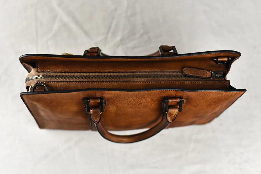 Men's 14-inch vegetable tanned leather handbag in horizontal square design