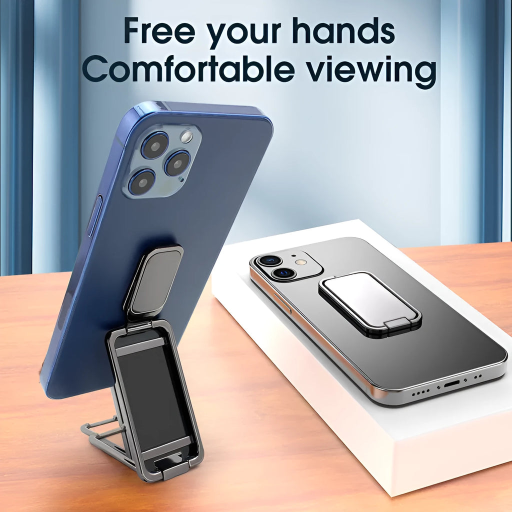 Foldable zinc alloy phone holder ring buckle in silver on a desk propping an iPhone at an angle.