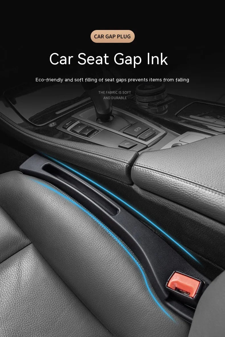 Black car seat gap storage box with handle between vehicle seats