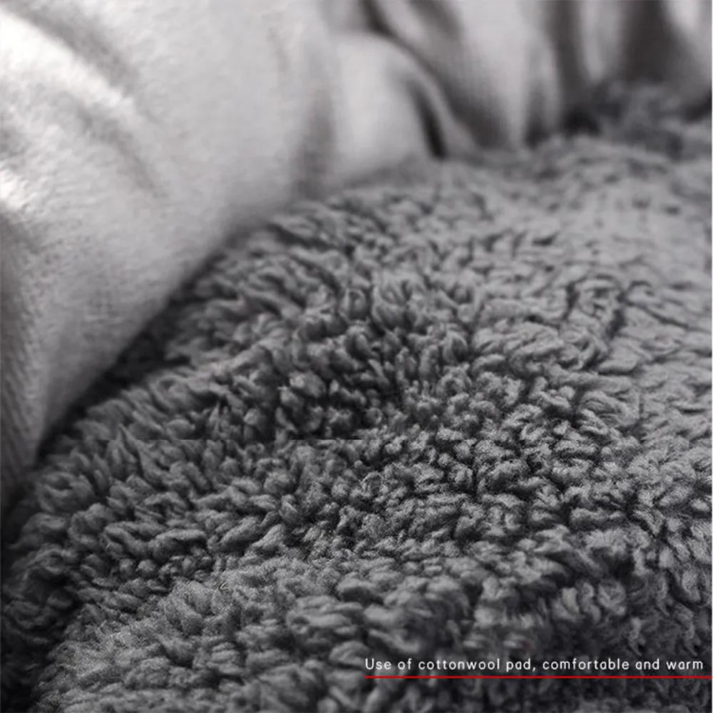 Gray round flannel pet bed for small dogs and cats with pillow on non-slip base