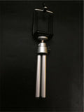 Black desktop phone holder with two-section metal bracket on office desk