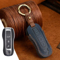Authentic brown cowhide leather Porsche key cover with a retro metal bag buckle closure.