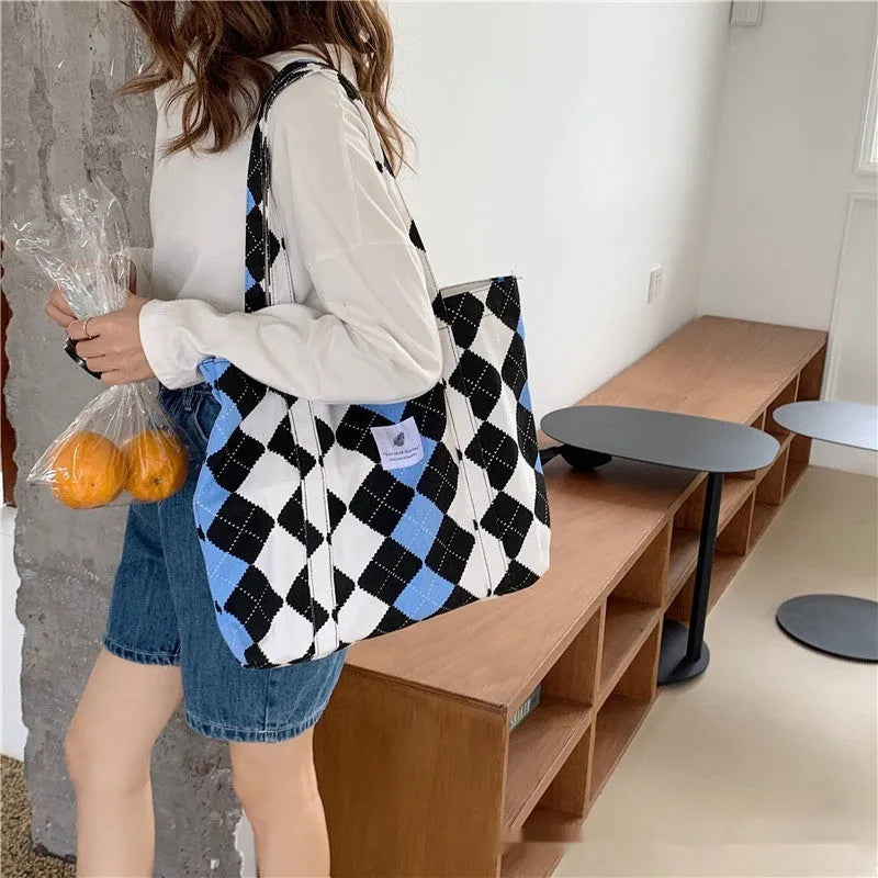 Large capacity Oxford cloth shoulder bag for women with three-dimensional outer pocket, available in pink, black, sapphire blue, and colour options.